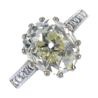 An 18ct gold diamond single-stone ring. The oval-shape old-cut diamond, weighing 3.09cts, to the bri