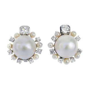 A pair of mabe pearl, diamond and seed pearl cluster earrings. Each designed as a mabe pearl, measur