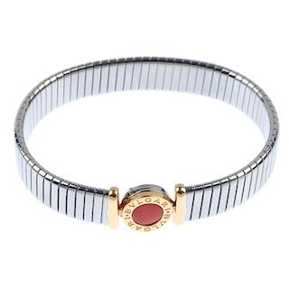 Bulgari- an 18ct gold and steel 'Bulgari' coral bracelet. The circular-shape coral, within an 18ct g