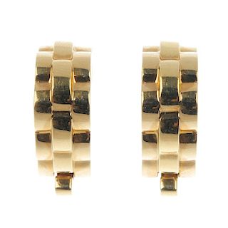 CARTIER - a pair of cufflinks. Each designed as a brick-link half hoop, with hinged bar fitting. Sig