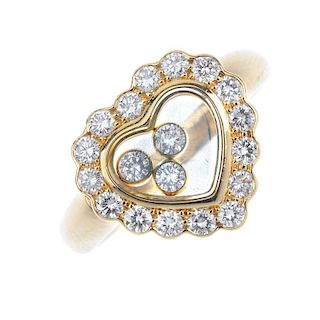 CHOPARD - a 'Happy Diamonds' ring. The three free-moving brilliant-cut diamond collets, within a sim