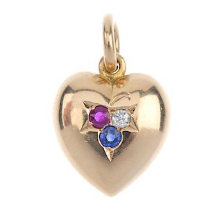 A gem-set heart pendant. The heart-shape panel, inset with an old-cut diamond and circular-shape sap