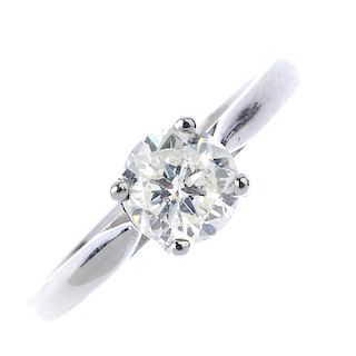 An 18ct gold diamond single-stone ring. The brilliant-cut diamond, to the plain band. Estimated diam