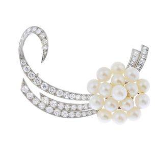 A cultured pearl and diamond spray brooch. The cultured pearl cluster, to the brilliant and baguette