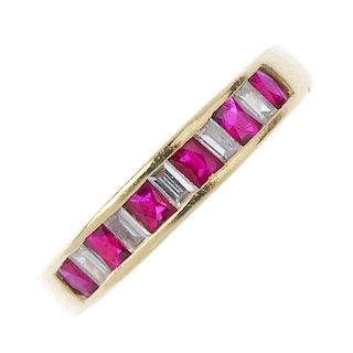 A diamond and ruby half-circle eternity ring. The alternating rectangular-shape ruby and baguette-cu