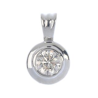 A diamond pendant. The brilliant-cut diamond collet, within a polished surround, to the tapered surm