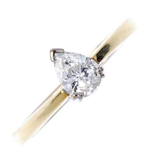 An 18ct gold diamond single-stone ring. The pear-shape diamond, to the plain band. Diamond weight 0.