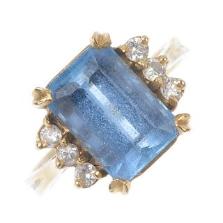 An aquamarine and diamond dress ring. The rectangular-shape aquamarine, with brilliant-cut diamond l