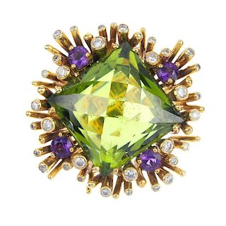 A sphene, amethyst and diamond dress ring. The square-shape sphene, within a radial surround, with c