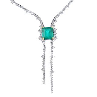 An emerald and diamond necklace. The front designed as a rectangular-shape emerald, with articulated