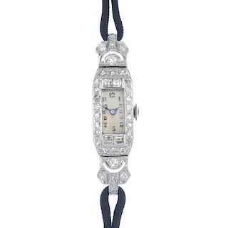 A lady's early 20th century diamond cocktail watch. The rectangular-shape white dial, with black Ara