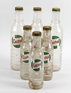 A collection of 21 assorted Castrol motor oil glass bottles. Comprising seven large (XXL, XL and Cas