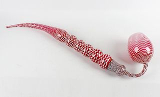 A good Victorian 'Nailsea' cranberry glass frigger pipe, of two-piece construction, the curved stem