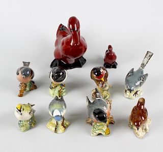 A group of Royal Doulton and Beswick birds Comprising: a Doulton flambe duck, 6, (15cm) high, anothe