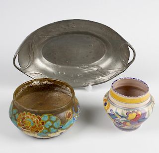 A small Poole pottery bowl, of shouldered form decorated with flowers and with impressed mark beneat