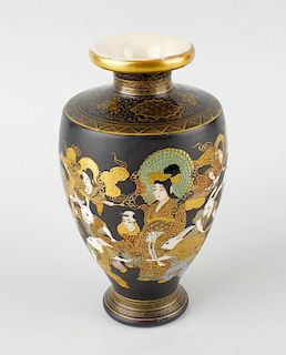An unusual Japanese satsuma vase, of tapering shouldered form with short flared neck, finely decorat