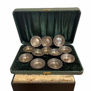 12 Sterling Nut Cups in a case 