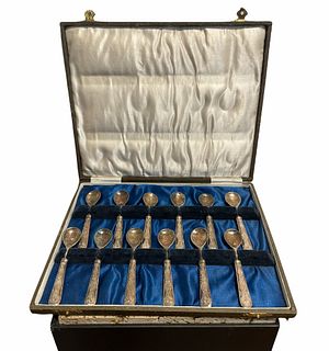 12 German Silver Spoons in a case 