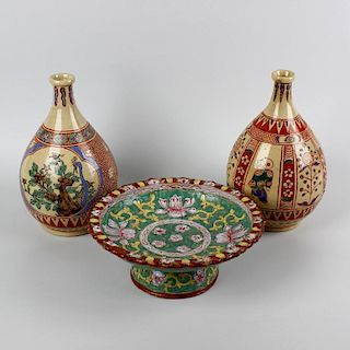 A group of Japanese ceramics. To include a pair of pottery vases, each of bulbous form, one decorate