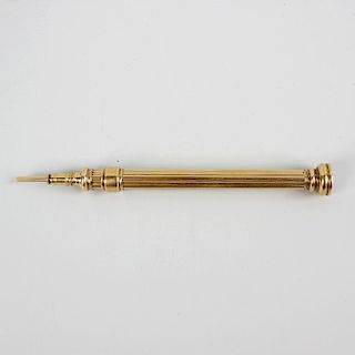 A yellow metal retractable pencil. The ribbed barrel marked 'Goldsmiths Alliance' and leading to the