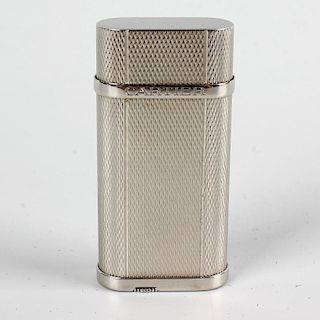 A Cartier silver-plated lighter with textured finish, 2.5 (6cm). <br><br>Minor wear to body, includi