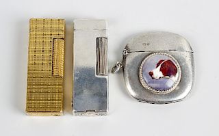 A group of assorted cigarette lighters Comprising: an Edwardian silver example, of rounded oblong ve