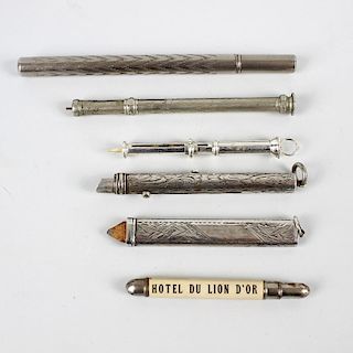 Six assorted objects of virtue. To include a silver pencil holder, cased dip-pen, combination pen/pe