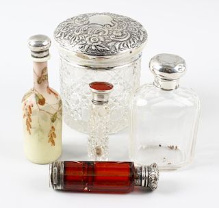 A selection of scent bottles to include a cut glass dressing table jar with Sheffield 1900 hallmarke