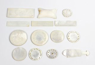 A small collection of 19th century Chinese mother-of-pearl gaming counters To include two large circ