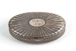 A Continental white metal oval snuff box Circa 1800, the fan-reeded hinged cover with oval cartouche