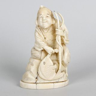A Japanese Meiji period ivory okimono of a fisherman. Modelled seated upon a rock holding a bamboo f