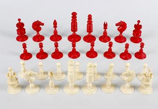 A 19th century ivory 'Barleycorn' type chess set, evolved from 'Captain Cook' pattern of c.1770, red