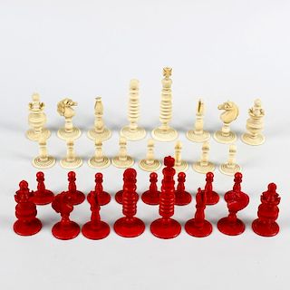 A good 19th century turned ivory chess set. Red-stained and natural, of 'Calvert pattern, in wooden