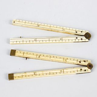 Two ivory miniature folding rules. Each 3, (7.5cm) long (closed, (2). <br><br>Both in good used cond