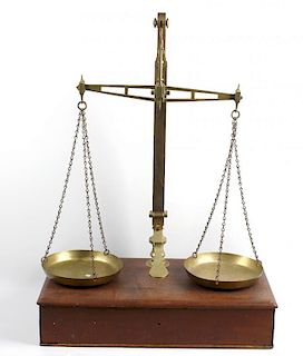 A set of Victorian Avery scales and weights The scrolled-topped brass column with lever to base stam