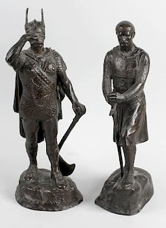 Two bronze figures. Modelled as a Viking and Crusader stood upon naturalistic base having cast signa