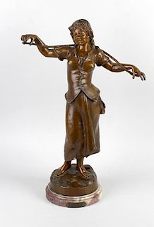 Marcel Debut, (1865-1933), A bronze figure 'Flanerie', modelled as a female figure with rustic yoke