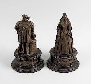 Two bronzed copper figures, modelled as Henry VIII, Queen Elizabeth I, he resting his hand upon armo