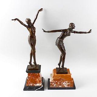 Two large reproduction Art Deco style bronze figures of dancers. In the manner of Chiparus, both fem