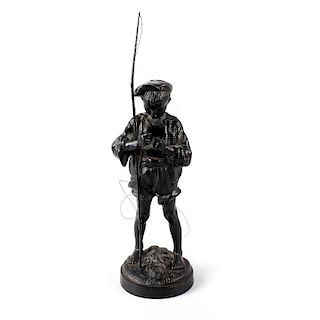 A 20th century Russian iron figure. Modelled as a young fisherboy dressed in rolled up shorts and st