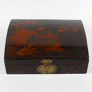 A late 19th century Oriental dome-topped lacquer box. The hinged rectangular cover decorated with fl