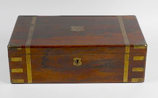 A 19th century rosewood veneered and brass bound writing slope. The hinged rectangular cover lifting