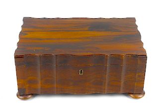 A 19th century Anglo-Indian coromandel sewing box South India/Sri Lanka (Ceylon) Of wavy oblong form