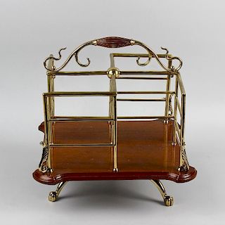 A Victorian Arts and Crafts revolving table bookstand. In the manner of WAS Benson, of square form d