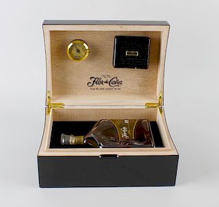 A boxed 750ml bottle of Ron Flor de cana single estate rum. 18 years old, 35% ABV, in branded humido