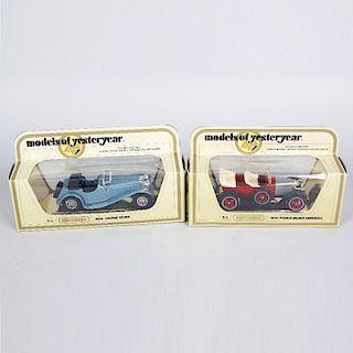 A box containing a selection of Matchbox Models of Yesteryear diecast model vehicles, each in origin