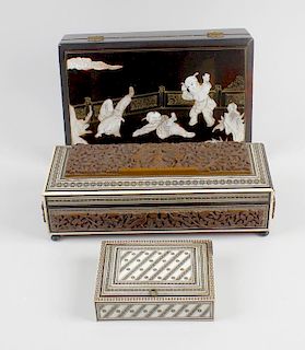 A box containing a mixed selection of Eastern boxes. To include a black lacquered jewellery box deco