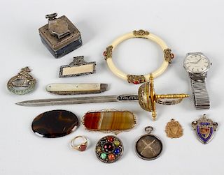 A box containing a mixed selection of assorted items to include a banded agate ladies brooch with ye