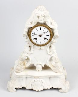 A French white marble clock and stand The 3.25-inch white Roman dial inscribed with Versailles retai