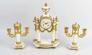A French portico clock garniture. The white enamelled dial having Arabic numerals and floral swag de